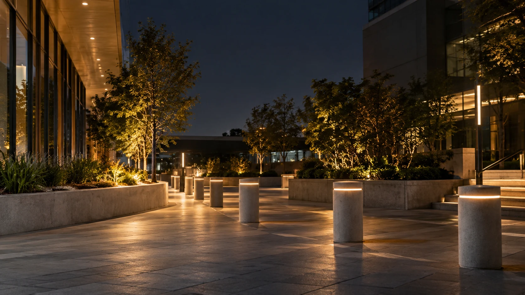 Public plaza with bollards and illuminated pedestrian paths