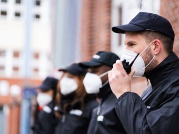 Security officers with face masks